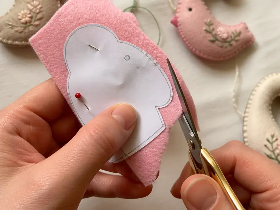 Cutting felt with the pattern pinned on top